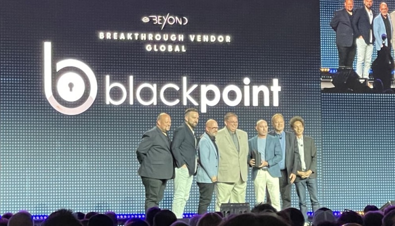 Blackpoint team on stage at Pax8 Beyond 2024